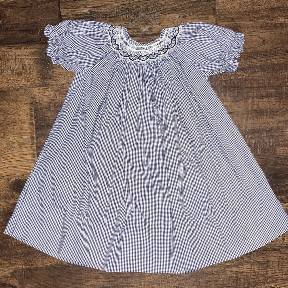 Size 12M smocked dress. No stains or holes.